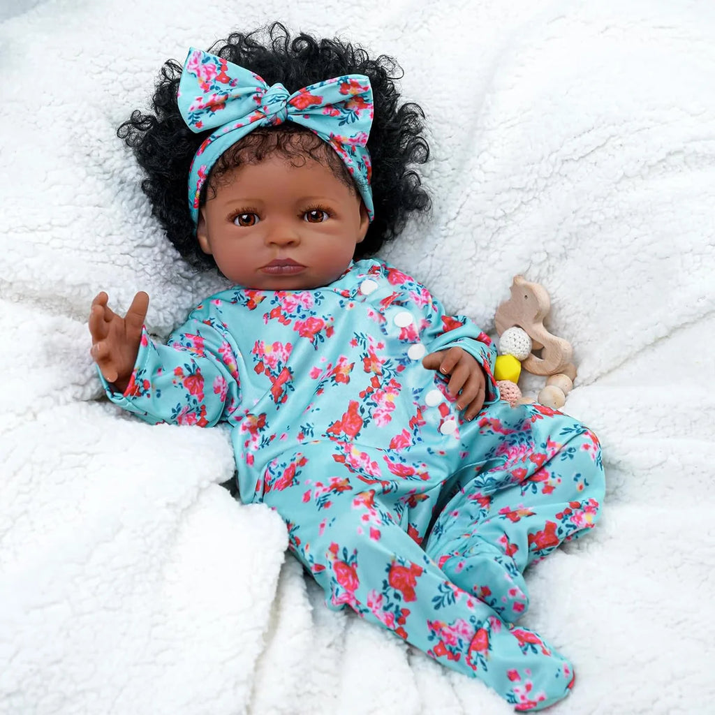 Boneca Bebê Reborn Realista Negra 55cm Silicone Conjunto de Roupa Chupeta Mamadeira e Pelúcia Original Completo