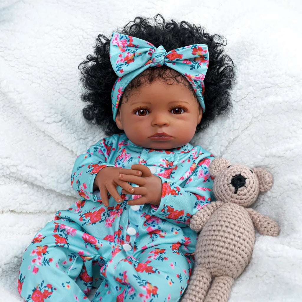 Boneca Bebê Reborn Realista Negra 55cm Silicone Conjunto de Roupa Chupeta Mamadeira e Pelúcia Original Completo