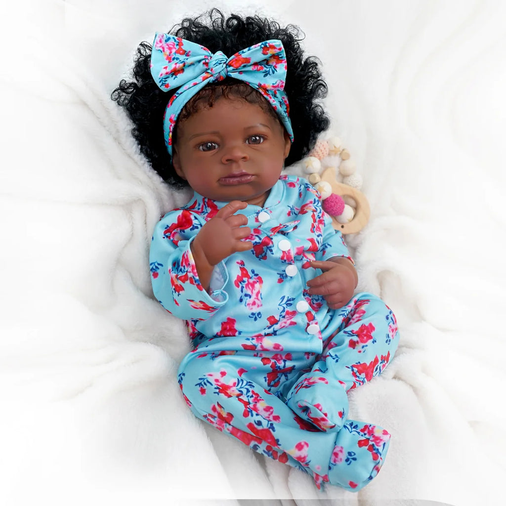 Boneca Bebê Reborn Realista Negra 55cm Silicone Conjunto de Roupa Chupeta Mamadeira e Pelúcia Original Completo