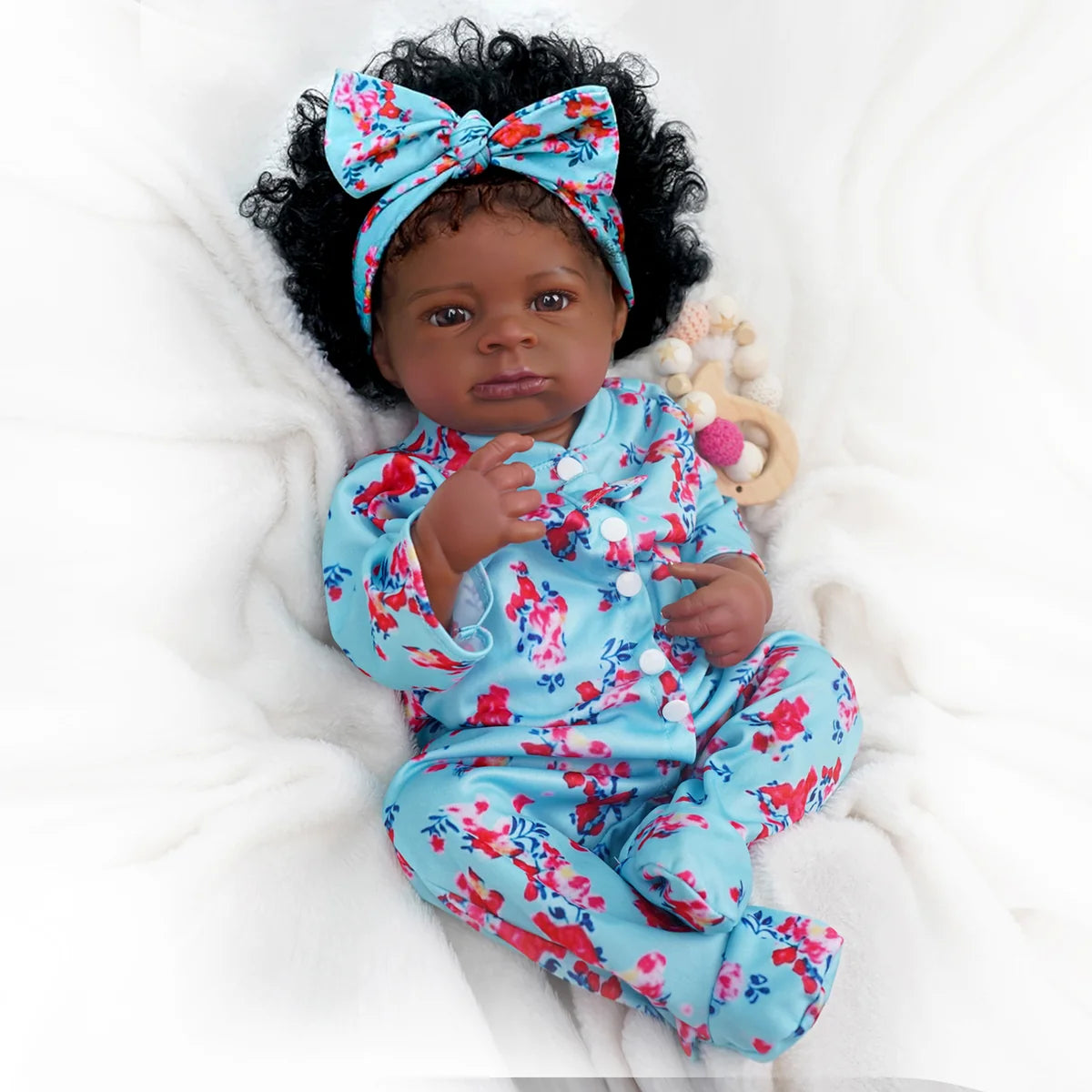 Boneca Bebê Reborn Realista Negra 55cm Silicone Conjunto de Roupa Chupeta Mamadeira e Pelúcia Original Completo