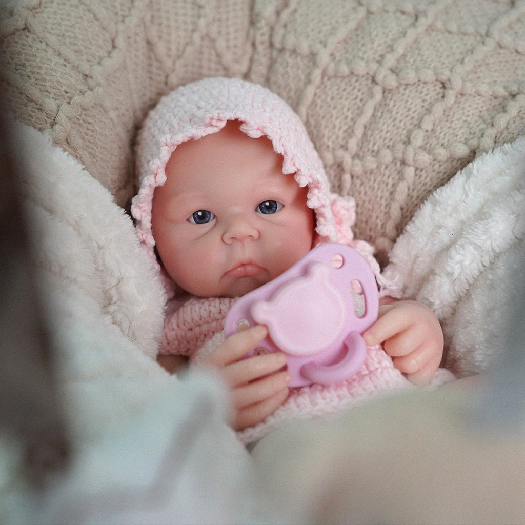 Bebê Reborn Boneca Silicone Sólido 35cm Original Pode Tomar Banho Com Kit Conjunto de Roupa Chupeta Mamadeira e Pelúcia
