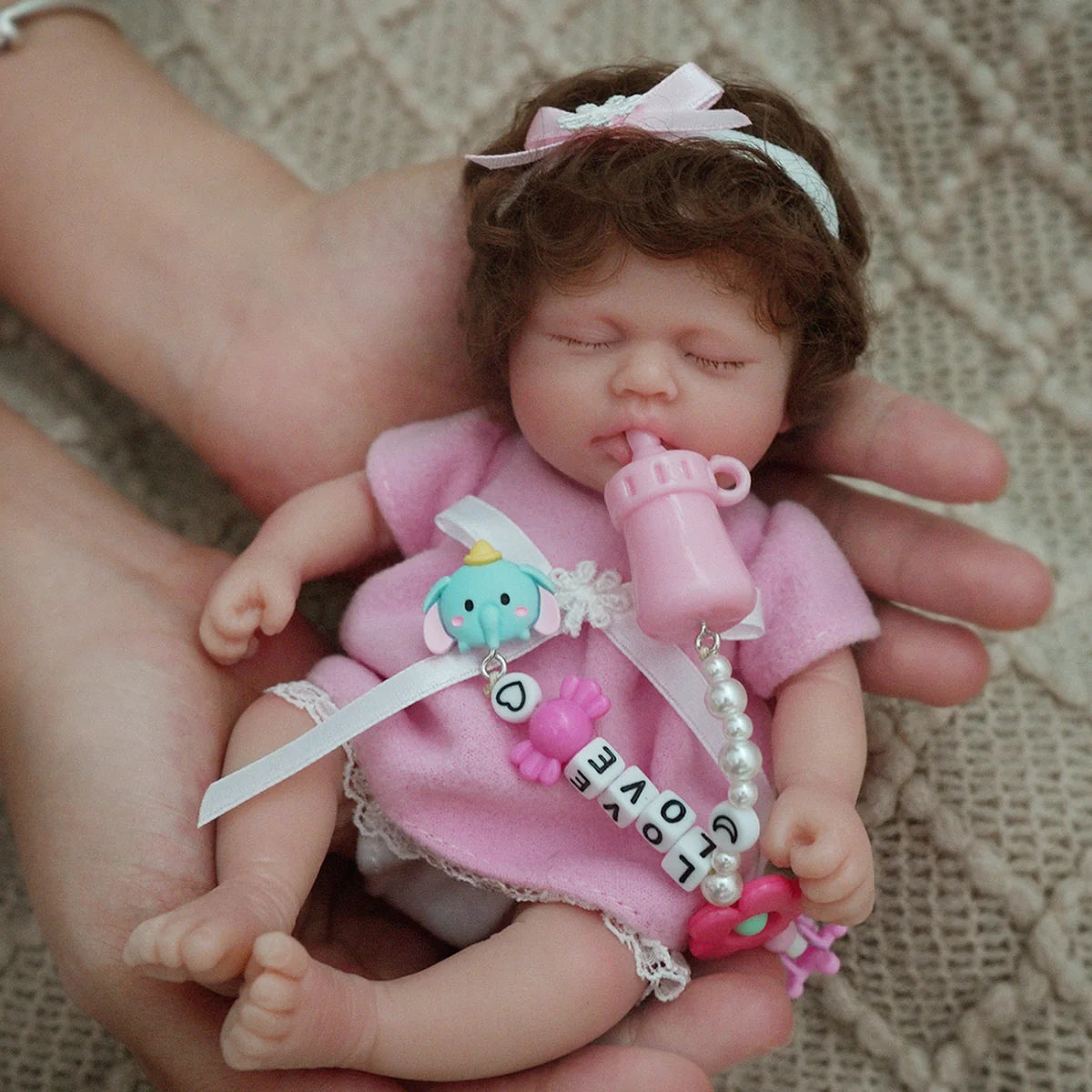 Boneca Bebê Reborn Realista Silicone Sólido 20 cm Conjunto de Roupa Chupeta Mamadeira e Pelúcia Original Completo