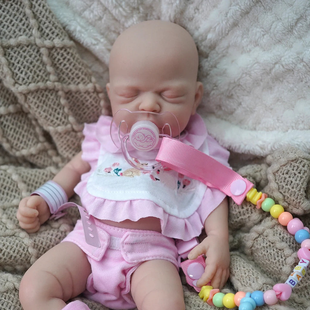 Bebê Reborn Boneca Silicone Sólido Menina 35cm Pode Tomar Banho Com 2 Conjuntos de Roupa Mamadeira Chupeta Pelúcia Certidão Fralda