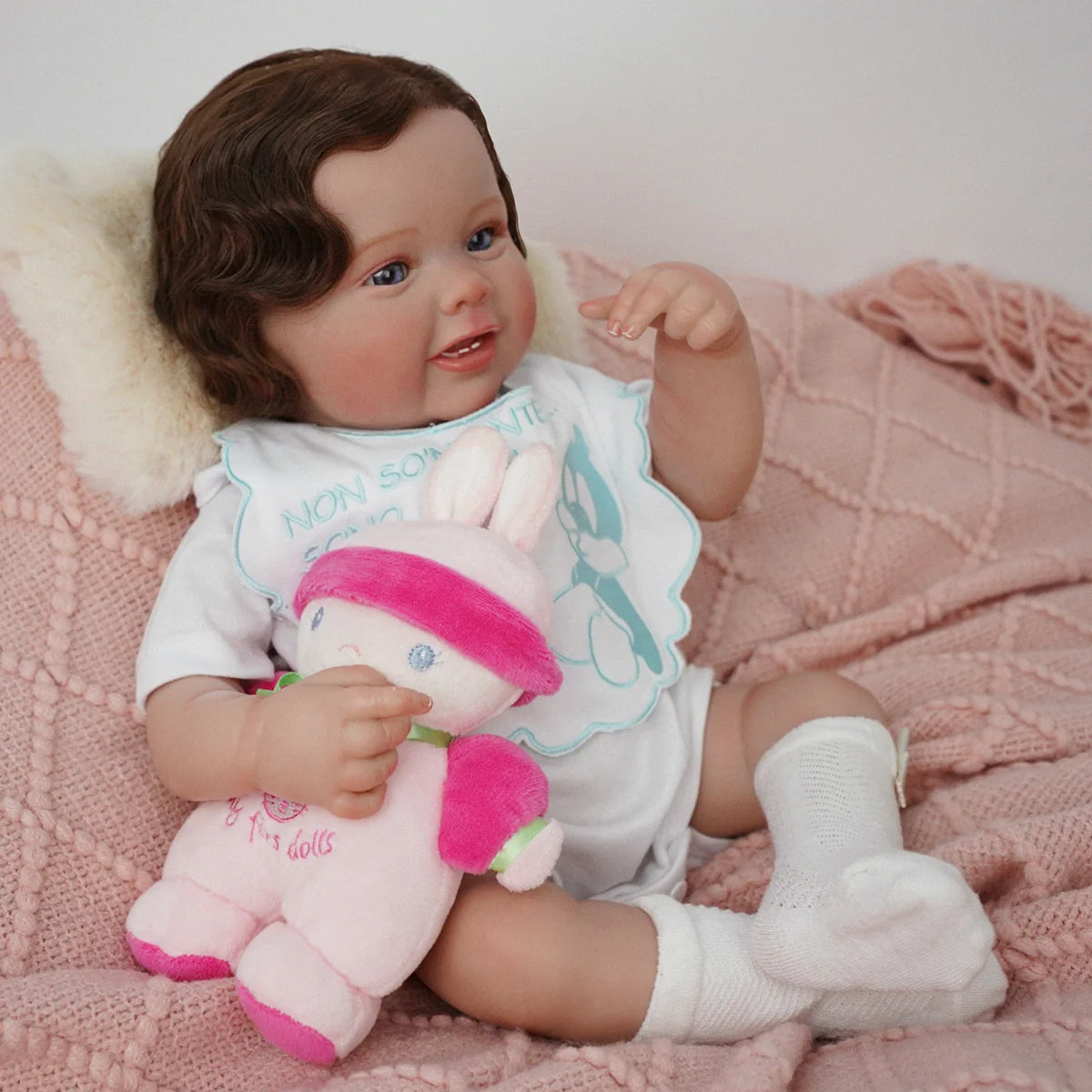 Boneca Bebê Reborn Silicone 48cm Conjunto de Roupa Mamadeira Chupeta Pelucia Brastoy