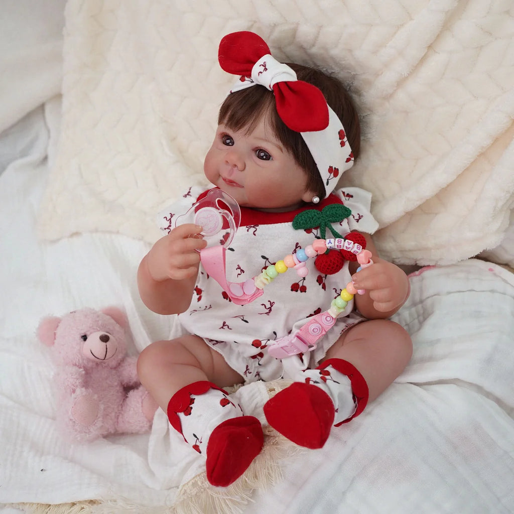 Boneca Bebê Reborn Silicone 48cm Conjunto de Roupa Mamadeira Chupeta Pelucia Brastoy